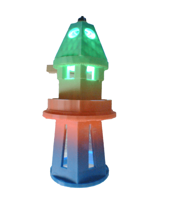Colorful toy lighthouse with glowing elements on top, showcasing a playful design. Ideal for children's decor or educational topics about navigation.